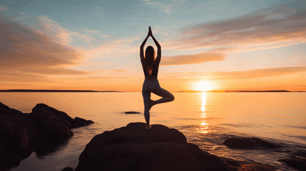 A serene sunrise yoga session by the ocean, with calming waves in the background